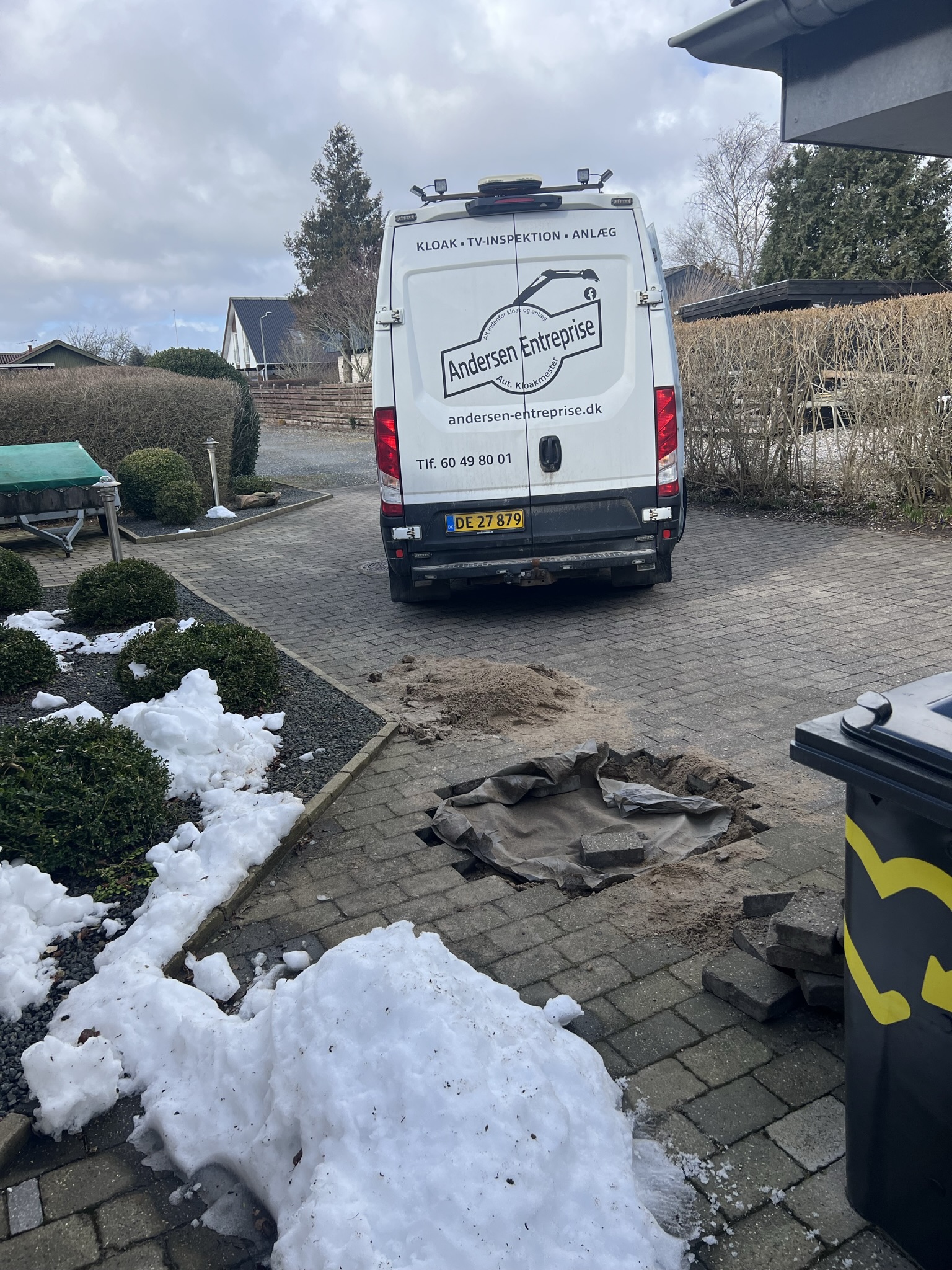 Punktrenovering af regnvandsledning under hus